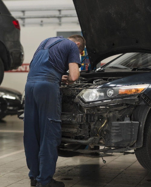 booknow-repair Man doing service for car